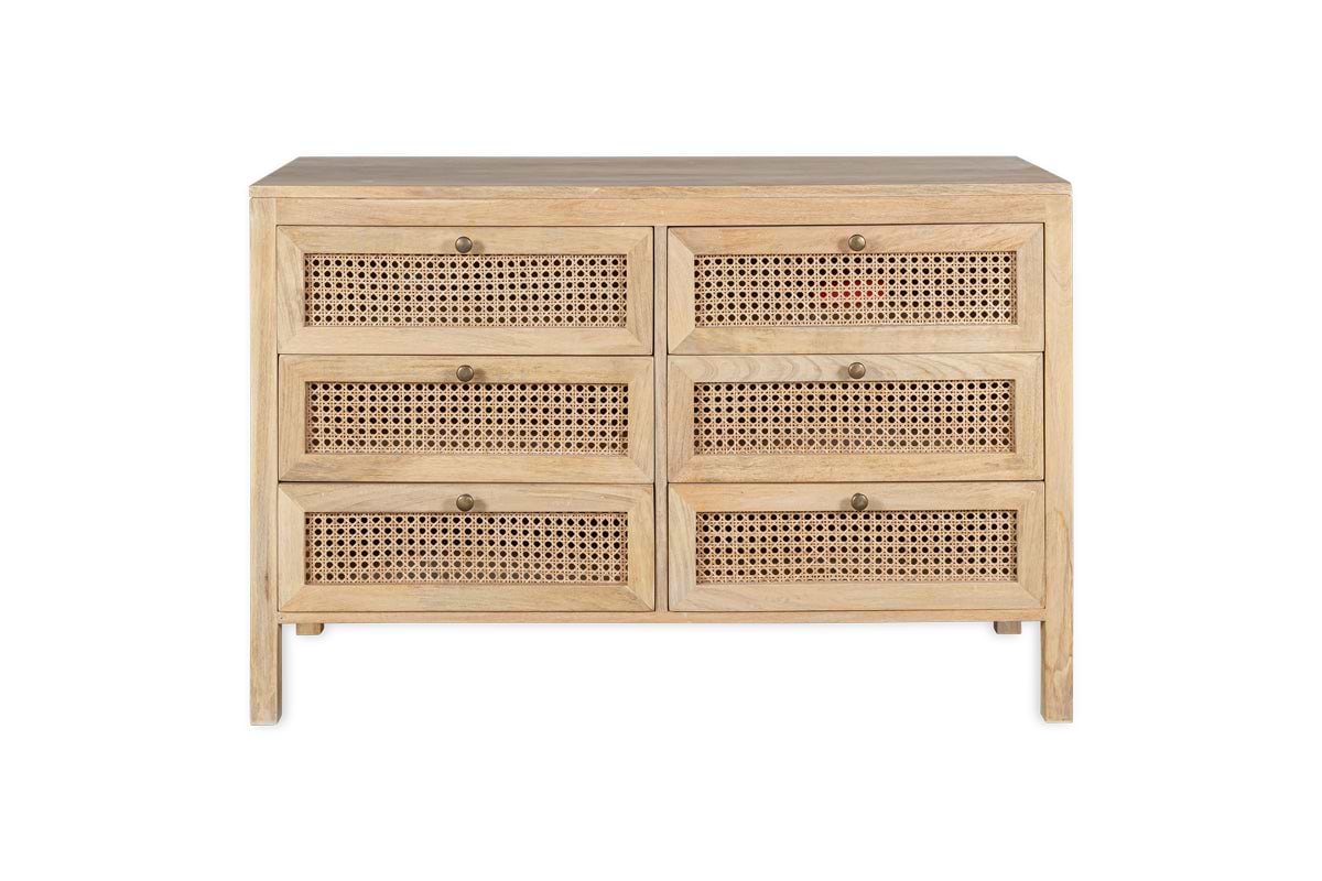 The nkuku Kanz Mango Wood Chest Of Drawers - Natural features six compartments, woven cane-front drawers, and round brass knobs. Made from light solid mango wood, it is shown against a white background.