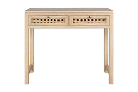 The nkuku Kanz Mango Wood Writing Desk features a natural finish, two front woven cane drawers with round knobs, simple straight legs, and a flat surface for a minimalist, modern look.