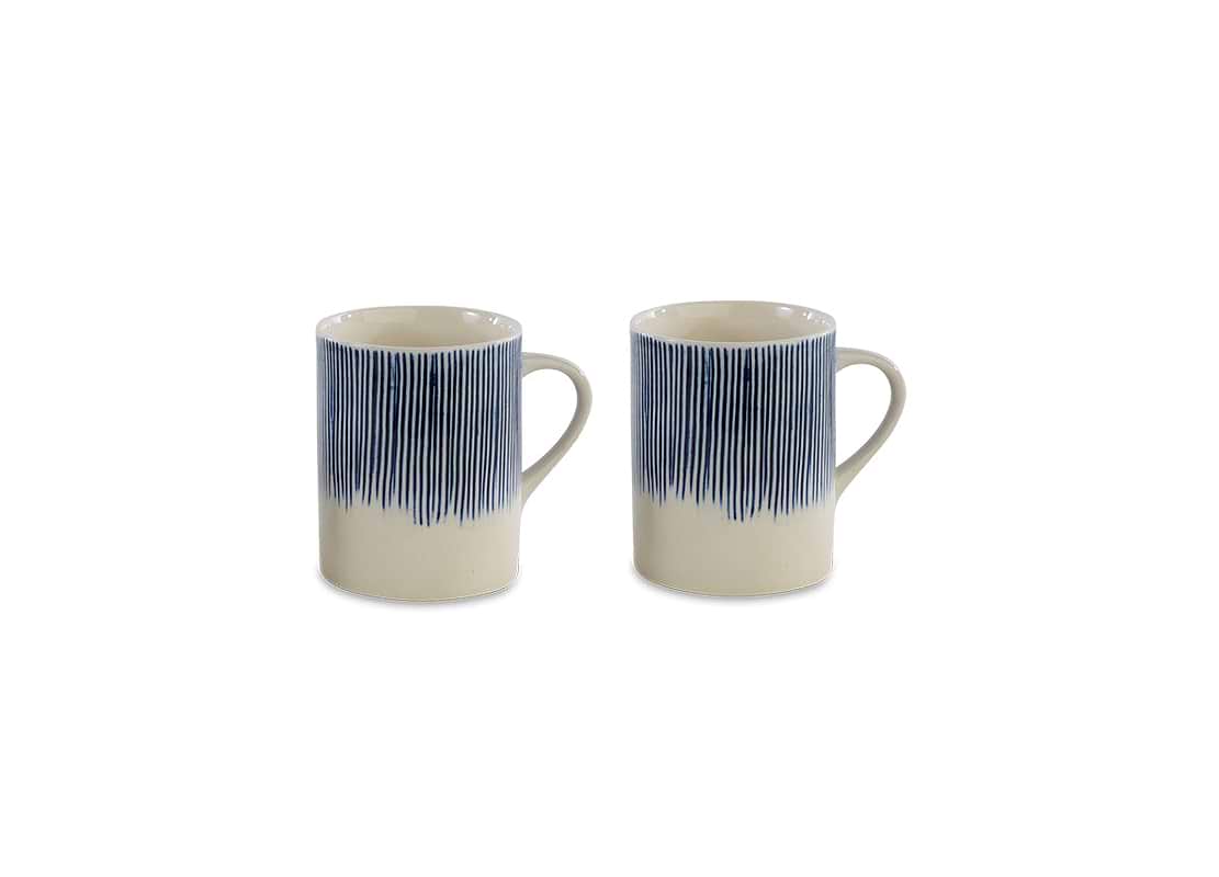 Karuma Ceramic Mug in large, set of two in white with blue etched lines, front view on a white background.