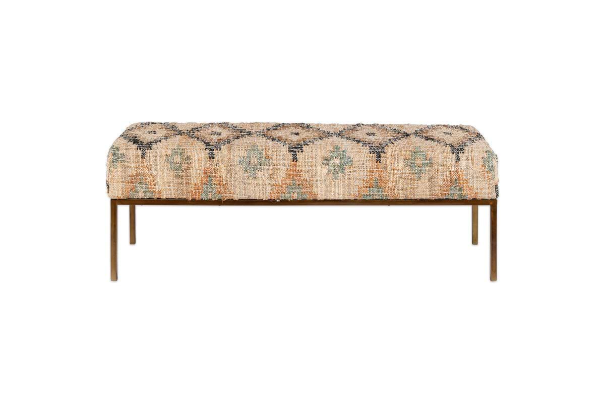 The Kesu Kilim & Iron Bench by nkuku features a handloom-woven seat in muted earth-toned patterns atop slim, bronze-finished iron legs for a minimalist look. Geometric designs on fabric; photographed against a plain white background.