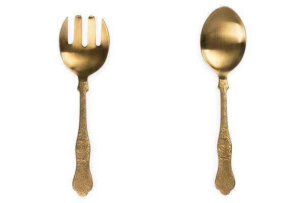 The Khana Salad Servers - Brushed Gold (Set of 2) by nkuku are displayed on a white background, featuring an elegant serving fork and matching spoon with hammered gold handles—ideal for stylish table settings.
