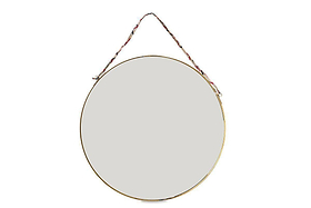 The nkuku Kiko Round Mirror - Brass features a slim antique brass frame and hangs from a colorful recycled sari tie, adding sustainable elegance to any space. Its modern design and blank reflection stand out against a white background.