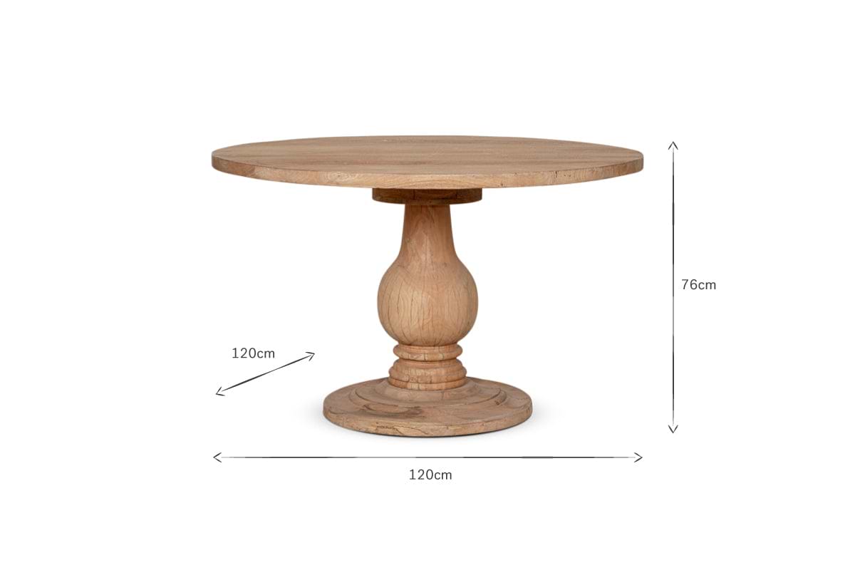 The Laya Round Carved Mango Wood Table - Small by nkuku is a 4-seater dining table with a single pedestal base, 120 cm diameter, and 76 cm height. It showcases a smooth natural finish and classic design. Dimensions shown on white background.