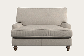 The Marri Love Seat - Brera Linen Natural by Nkuku is showcased front-facing against a plain, off-white background. This inviting piece features plush seat and back cushions in a light beige linen, subtly piped edges, gently rounded armrests, and four carved wooden legs that complement its sturdy hardwood frame, making it both comfortable and stylish.