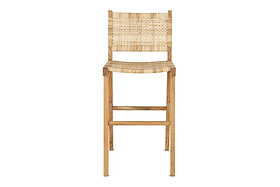 The Madrisana Acacia & Rattan Bar Stool by nkuku features a natural light acacia frame, woven rattan seat and rectangular backrest, straight legs, and a footrest bar. Its simple, modern design is shown against a white background.