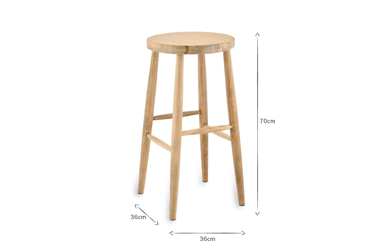 The Mengwi Mango Wood Round Bar Stool by nkuku features a natural finish, a light round top, sustainable mango wood construction, four tapered legs with footrests, and measures 70cm tall by 36cm wide.