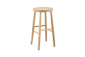 The Mengwi Mango Wood Round Bar Stool - Natural by nkuku is crafted from sustainable mango wood, featuring a light-toned seat and four tapered legs with horizontal supports for added stability.