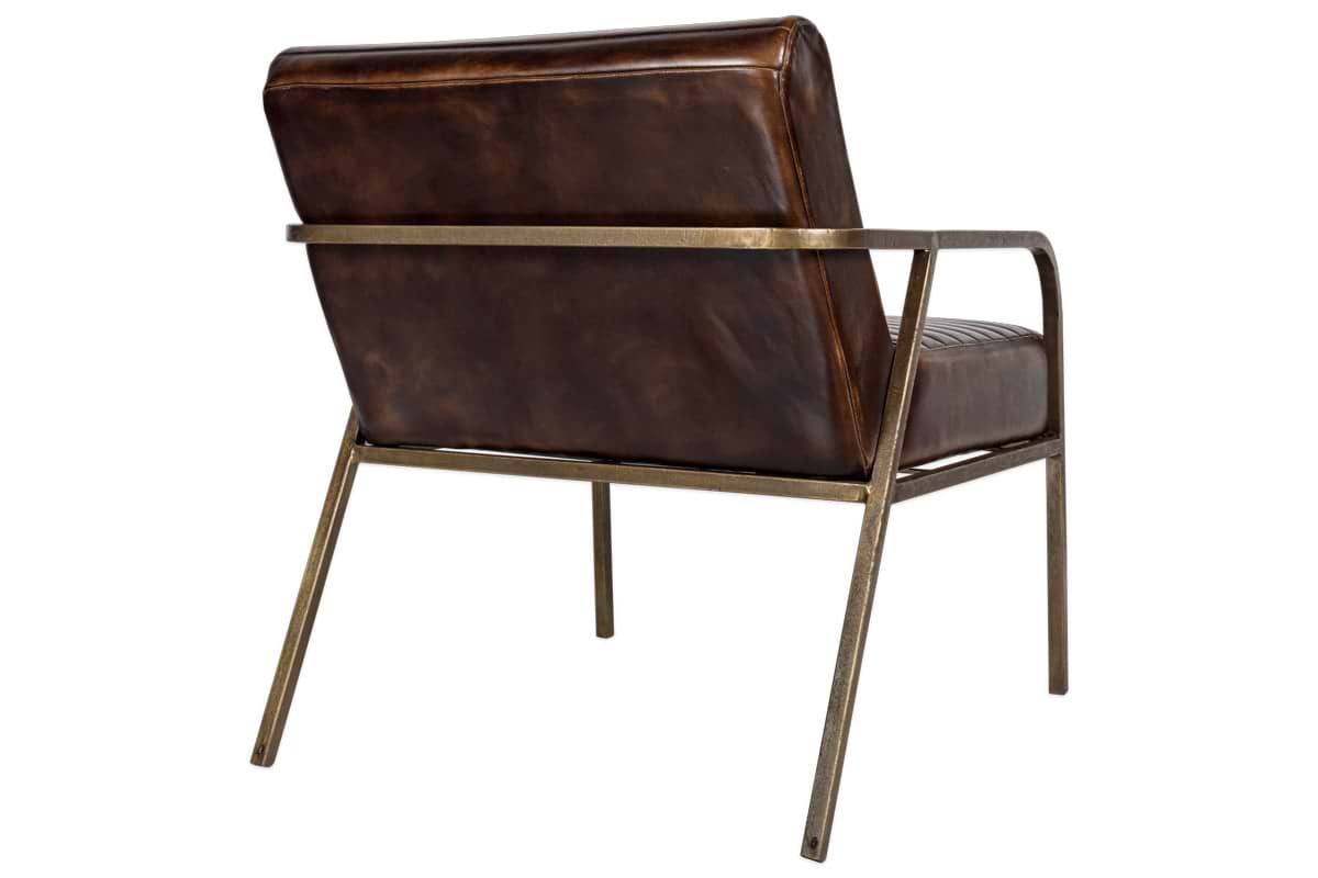 The Mirai Ribbed Leather Armchair by nkuku features buffalo leather, a slightly reclined backrest, and a sleek bronze-finished metal frame with slim armrests and legs, shown from the back and side against a white background.