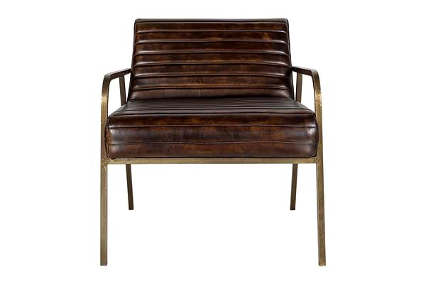 The Mirai Ribbed Leather Armchair by nkuku features a handmade design with ribbed dark brown leather, slim metallic gold armrests and legs, and a vintage industrial look. Shown from the front against a plain white background.