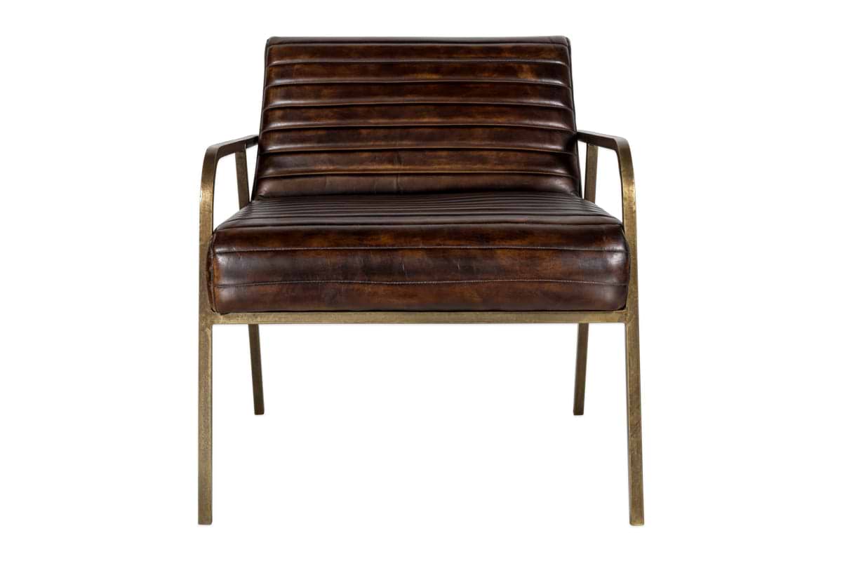 The Mirai Ribbed Leather Armchair by nkuku features a handmade design with ribbed dark brown leather, slim metallic gold armrests and legs, and a vintage industrial look. Shown from the front against a plain white background.