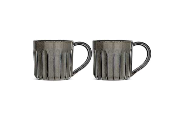 The Moda Mug - Pewter (Set of 2) by nkuku features two gray ceramic mugs with vertical ribbed texture, large rounded right handles, and glossy finish—all shown side by side against a white background.