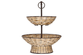 The nkuku Montali Rattan 2 Tier Fruit Stand in Black & Natural features a sturdy metal frame, spacious lower basket, compact upper basket, light tan rattan with dark accents, and a circular top handle—ideal for your kitchen counter.