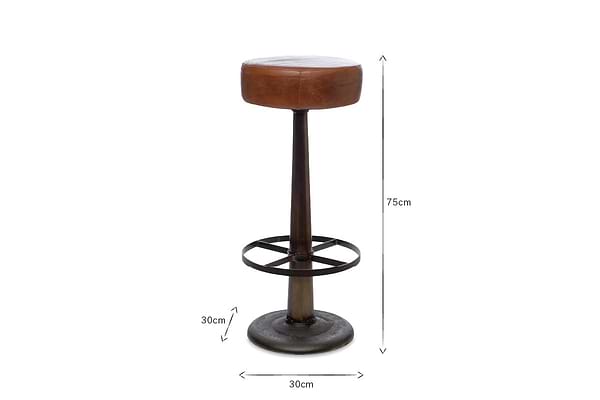The nkuku Narwana Leather Round Stool - Aged Tan features a tall 75 cm height, a round aged tan leather seat (30 cm wide), dark tapered metal base, and 30 cm circular footrest, all centered on a white background.