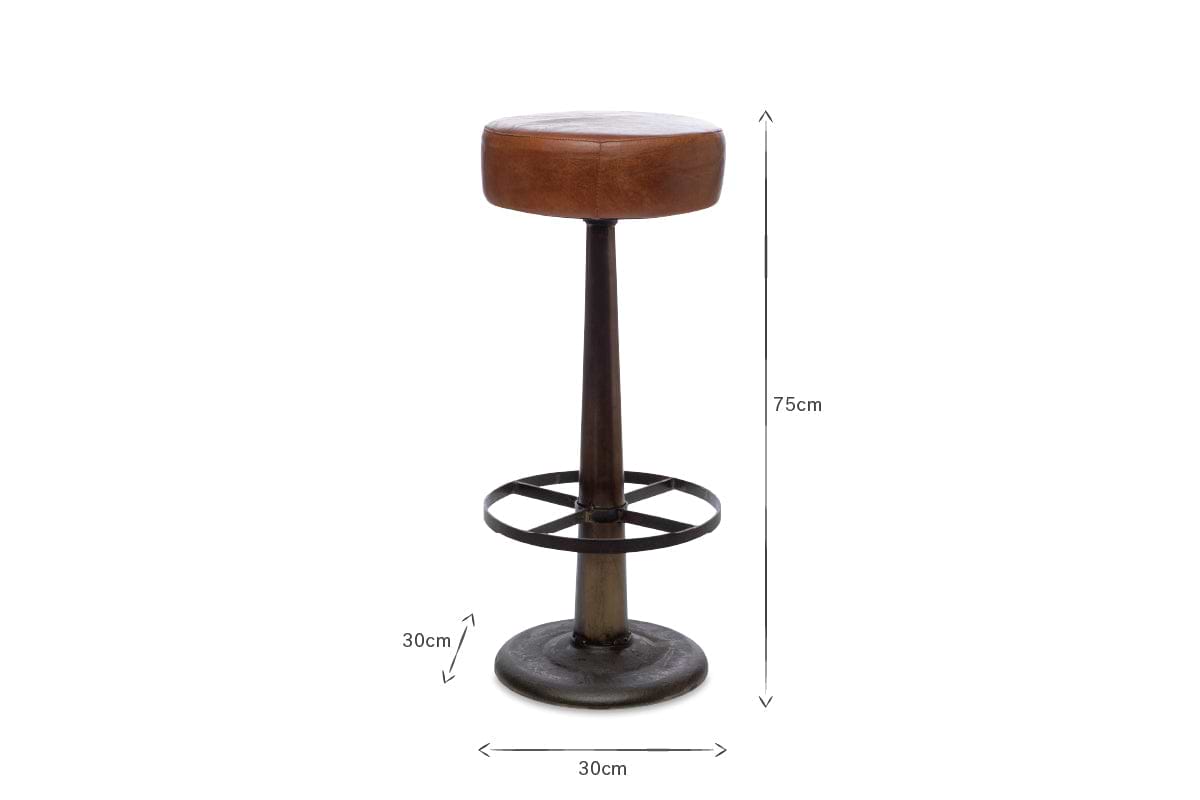 The nkuku Narwana Leather Round Stool - Aged Tan features a tall 75 cm height, a round aged tan leather seat (30 cm wide), dark tapered metal base, and 30 cm circular footrest, all centered on a white background.