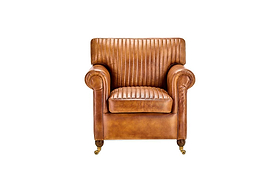 The nkuku Narwana Ribbed Leather Armchair - Aged Tan features ribbed stitching, rolled arms, and brass caster wheels on four legs, shown against a plain white background.