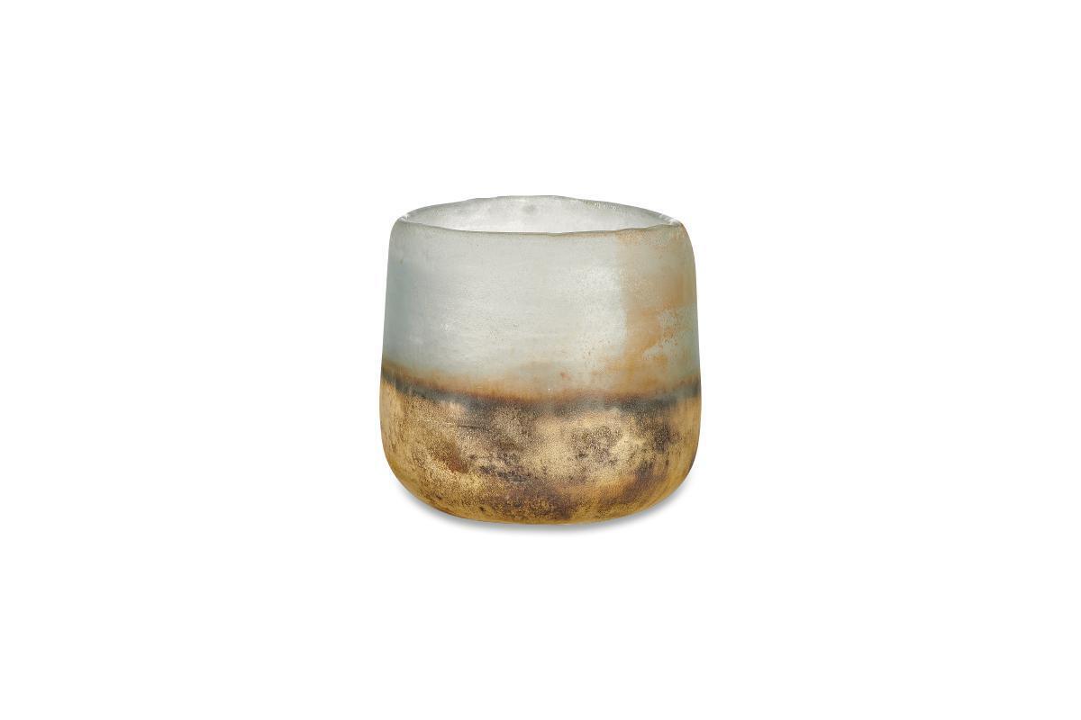 The Ngolo Tealight Holder - Aged Smoke by nkuku features a small, rounded design handmade from recycled glass, with a frosted white upper half blending into a gold and bronze textured base that adds atmospheric light to any space.
