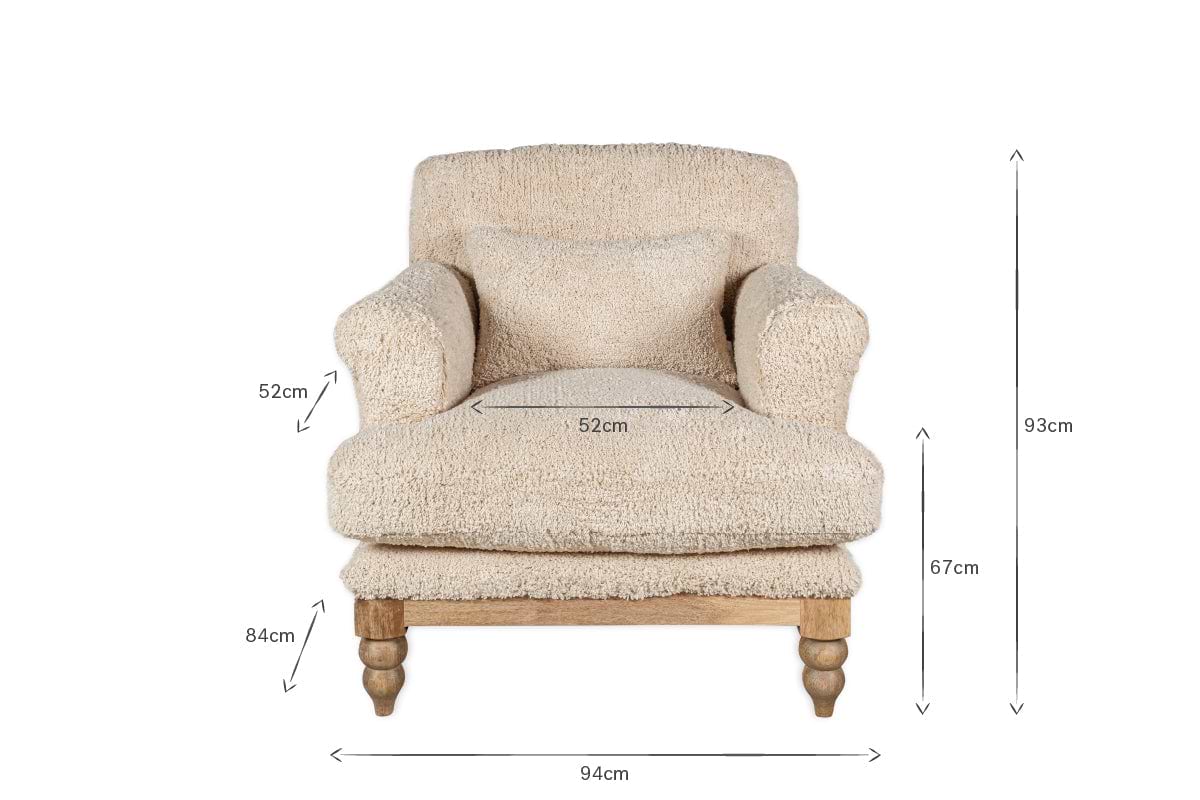 The nkuku Otas Teddy Cotton Armchair in Off White features a pillow, wooden legs, and a mango wood base. Dimensions labeled with arrows: 93cm tall, 94cm wide, 84cm deep; seat height 52cm, arm height 67cm, seat width 52cm.