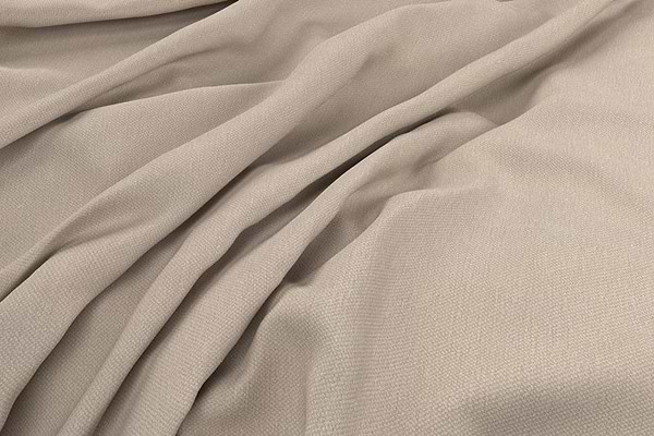 Close-up of nkuku's Recycled Cotton Natural Swatch, showcasing light beige fabric with a subtle woven texture, soft natural folds, gentle draping, and smooth yet slightly textured surface with shadowed valleys and raised ridges.