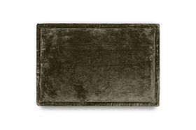 The nkuku Pilani Velvet & Linen Cushion Cover in Moss is a rectangular, deep green cushion cover with a smooth, plush velvet surface and stitched border, shown on a white background. It looks thick, soft, and elegant.