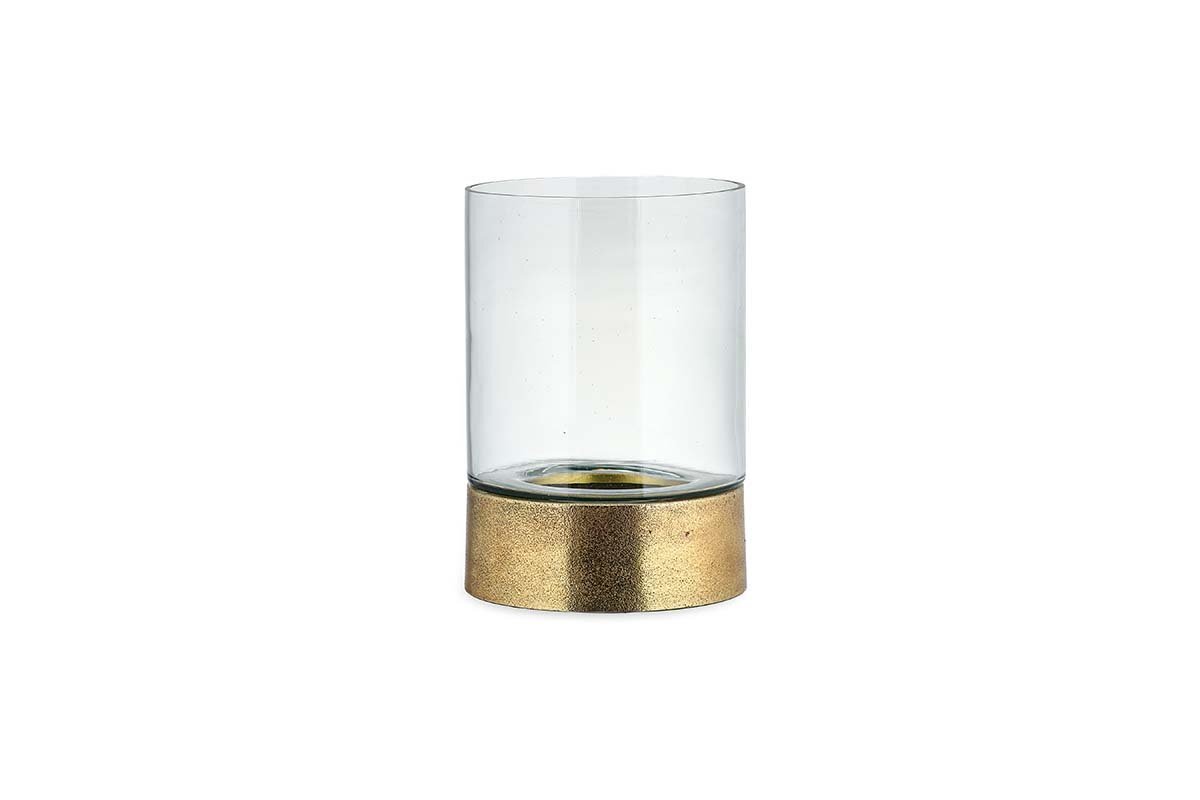 The Rajura Hurricane Lantern by nkuku is a clear cylindrical glass candle holder with a metallic gold base. Inspired by classic designs, its smooth lines and subtle shine create elegant ambient lighting, ideal for any plain white background.