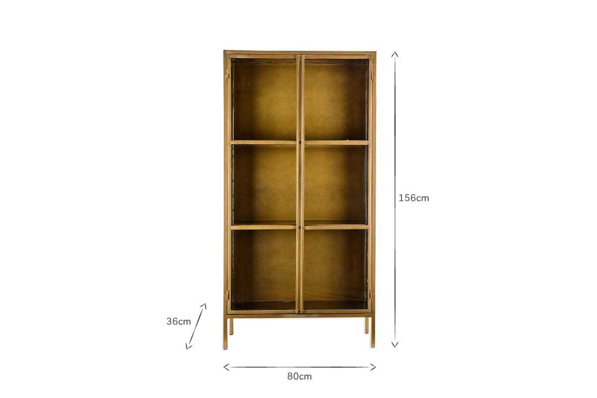 The nkuku Ranchi Iron Tall Cabinet features brass framing, glass-fronted doors, and six shelves. Measuring 156cm high, 80cm wide, and 36cm deep, it’s ideal for stylishly displaying your treasures.
