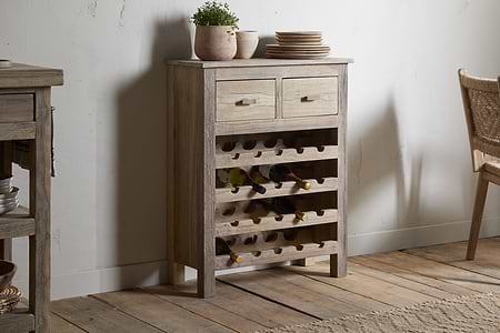 The Shanthi Reclaimed Wood Wine Rack by nkuku offers stylish wine bottle storage and space for bottles and plates, making it a perfect rustic addition to your home.