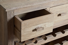 The Shanthi Reclaimed Wood Wine Rack by nkuku features a rustic, unfinished look with open lower compartments for wine storage, making it a perfect natural wine rack for your home.