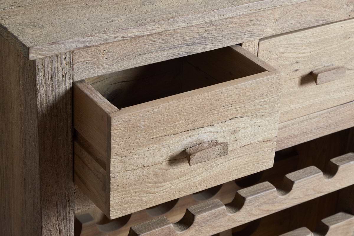 The Shanthi Reclaimed Wood Wine Rack by nkuku features a rustic, unfinished look with open lower compartments for wine storage, making it a perfect natural wine rack for your home.