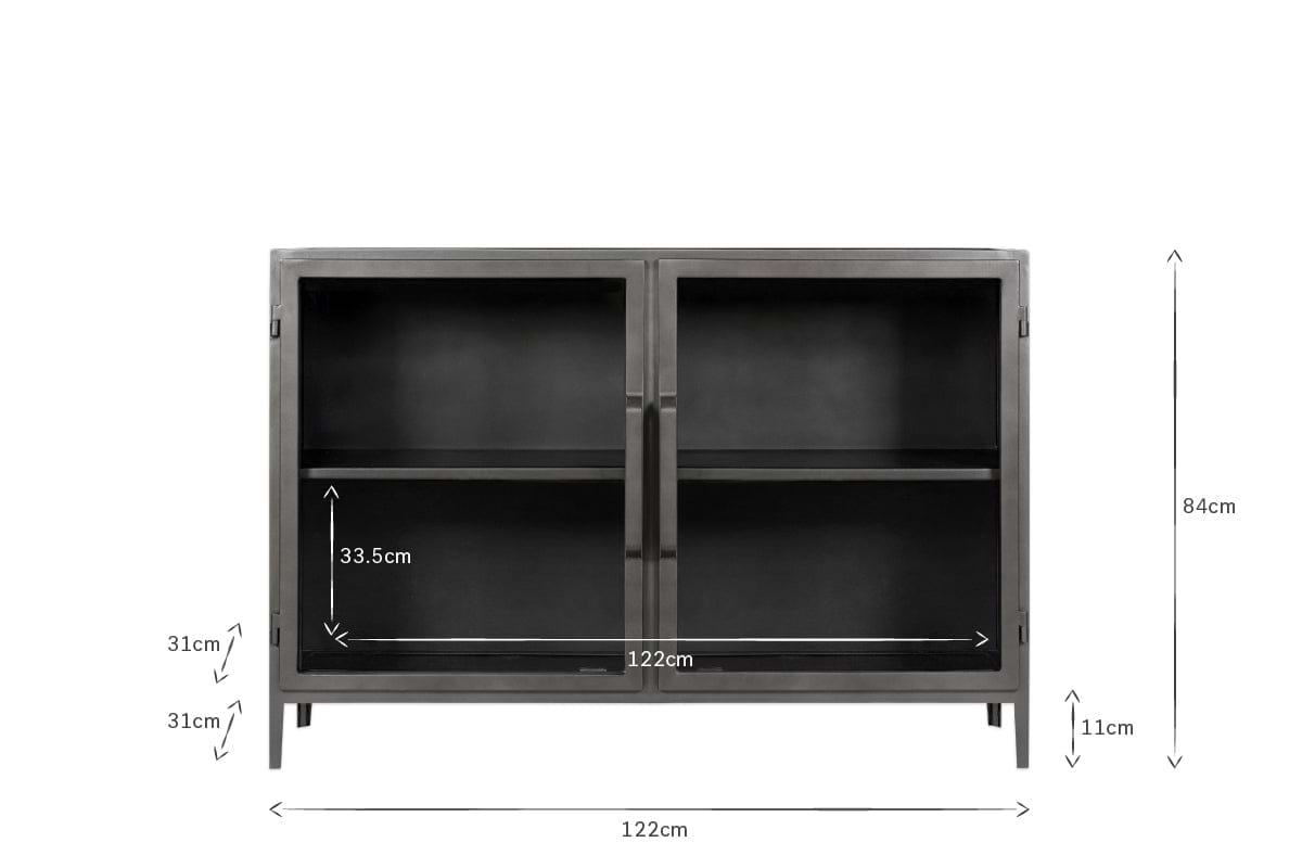The Takua Iron Sideboard by nkuku features a black metal frame, two glass doors, and four 11cm-high legs. Measuring 122cm wide, 84cm tall, and 31cm deep, it includes two adjustable shelves (33.5cm high) for flexible kitchen storage.