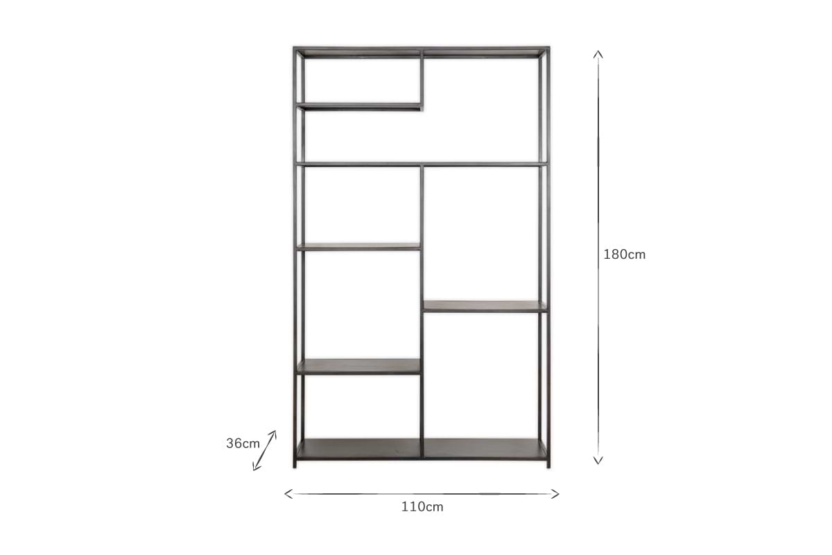 The Tanvi Display Shelf - Black - Wide by nkuku is a tall, rectangular black metal shelf with open, asymmetrical shelves. Measuring 180x110x36 cm, it offers a modern geometric look—ideal as a room divider or industrial shelving. White background.