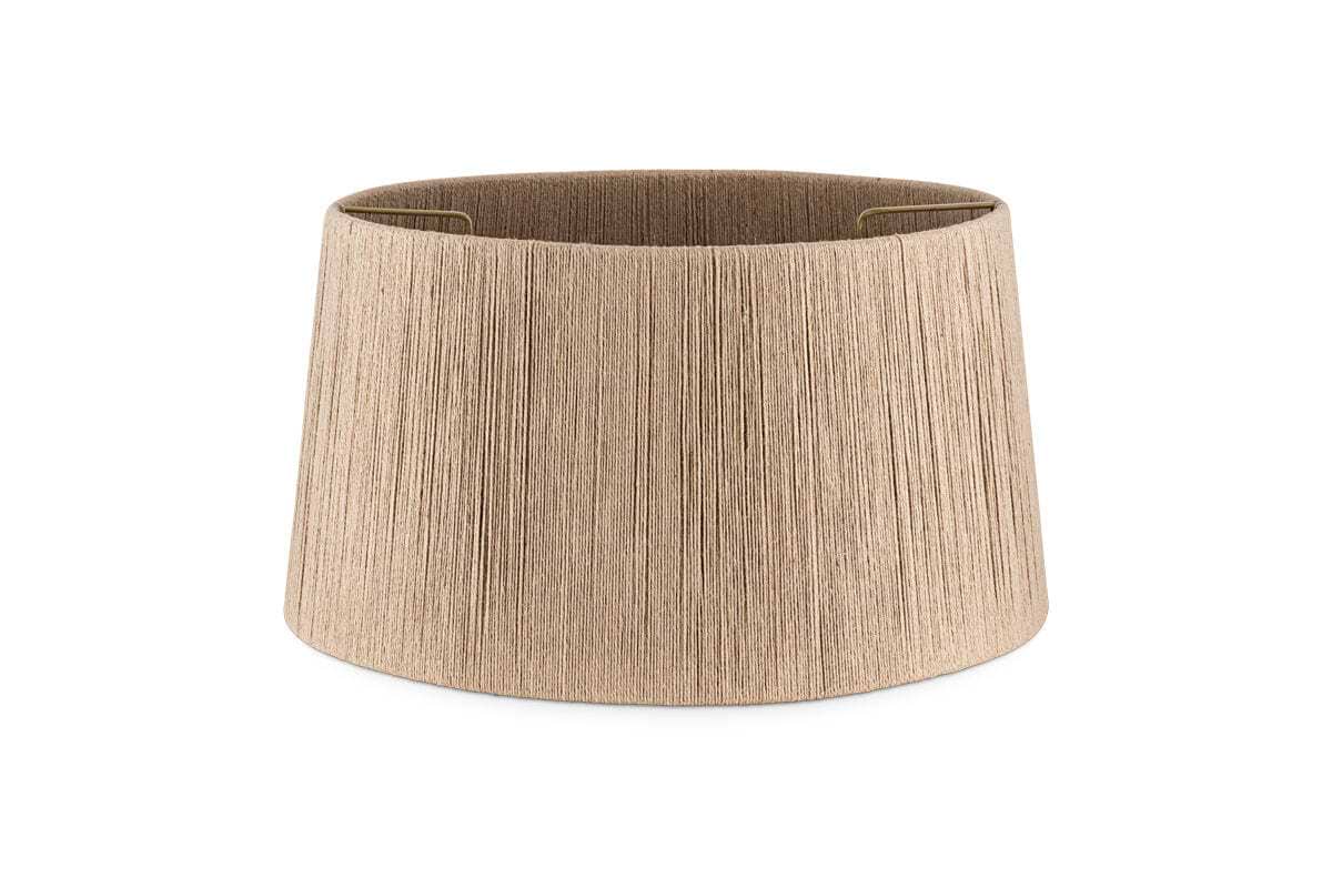 The Tiwa Woven Jute Lampshade - Natural by nkuku features a drum-shaped silhouette in beige, crafted from natural jute fibres that bring subtle texture and warmth to any space. Showcasing a vertical, textured pattern reminiscent of rustic lighting, this lampshade is pictured against a plain white background with its top opening visible to reveal part of the interior metal frame.