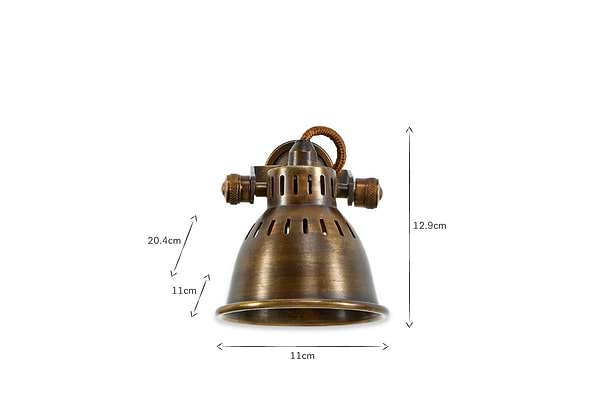 The Tubu Brass Spot Light by nkuku features an antique brass finish, adjustable lighting, and a dome-shaped shade. It measures 20.4 cm tall, 11 cm wide at the base, and 12.9 cm across the top, as shown with measurement arrows on a white background.