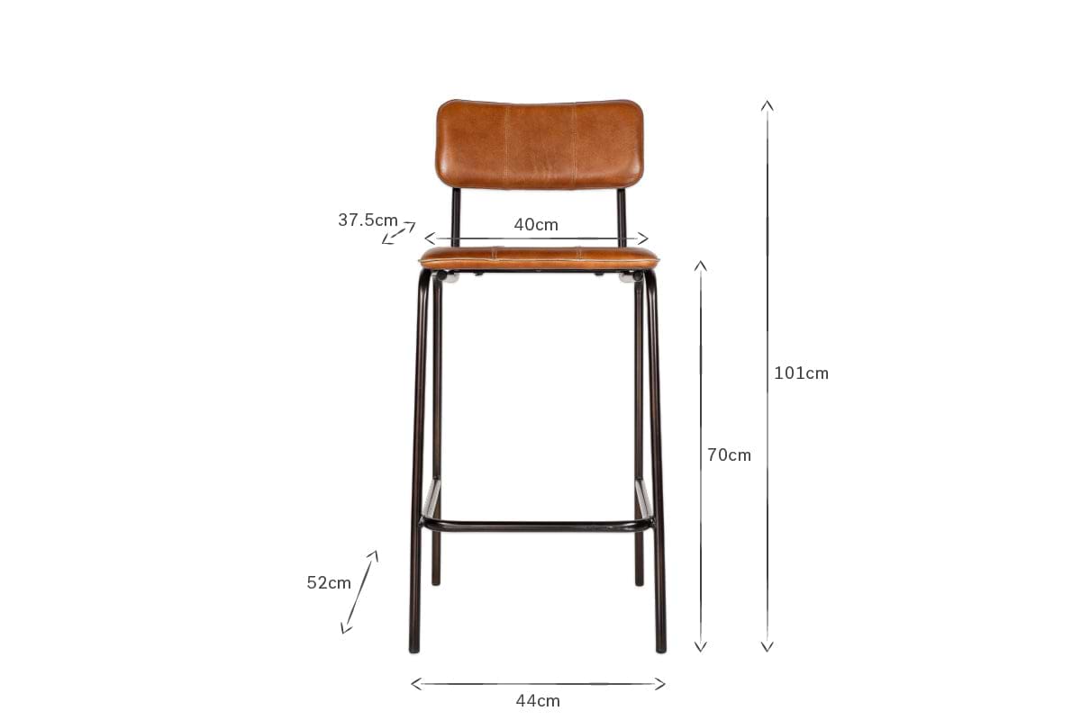 The Ukari Counter Chair - Aged Tan by nkuku features a handmade buffalo leather seat on a sturdy metal frame, measuring 101cm high, 70cm seat height, 40cm wide seat, and 44cm wide base.