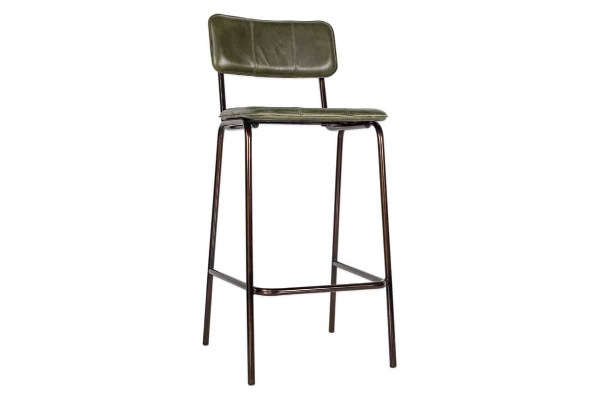 The Ukari Counter Chair - Rich Green by nkuku features a tall, cushioned seat and backrest in leather-like material, slender dark metal legs with a front footrest, offering a minimalist industrial style.