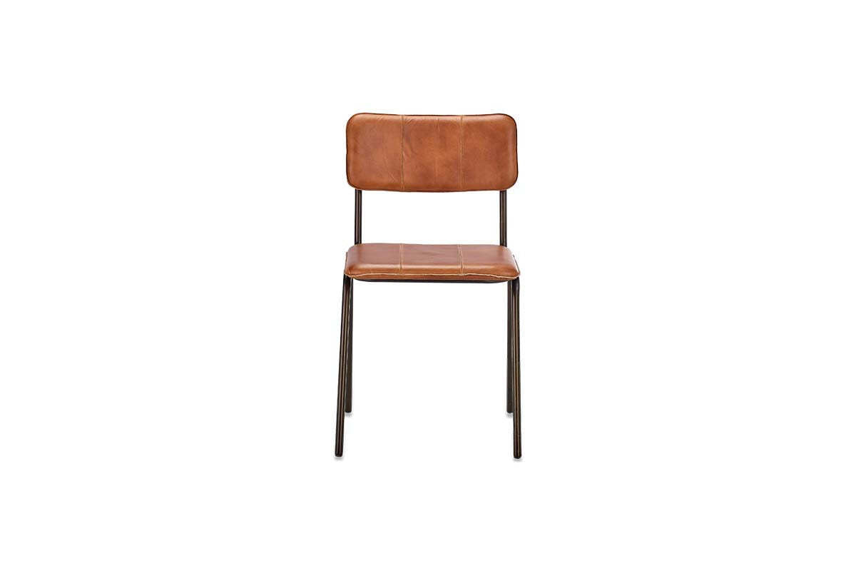 The nkuku Ukari Leather Dining Chair in Aged Tan features buffalo leather upholstery, a padded seat and backrest, and four slim black metal legs. Its simple modern design highlights straight lines against a plain white background.