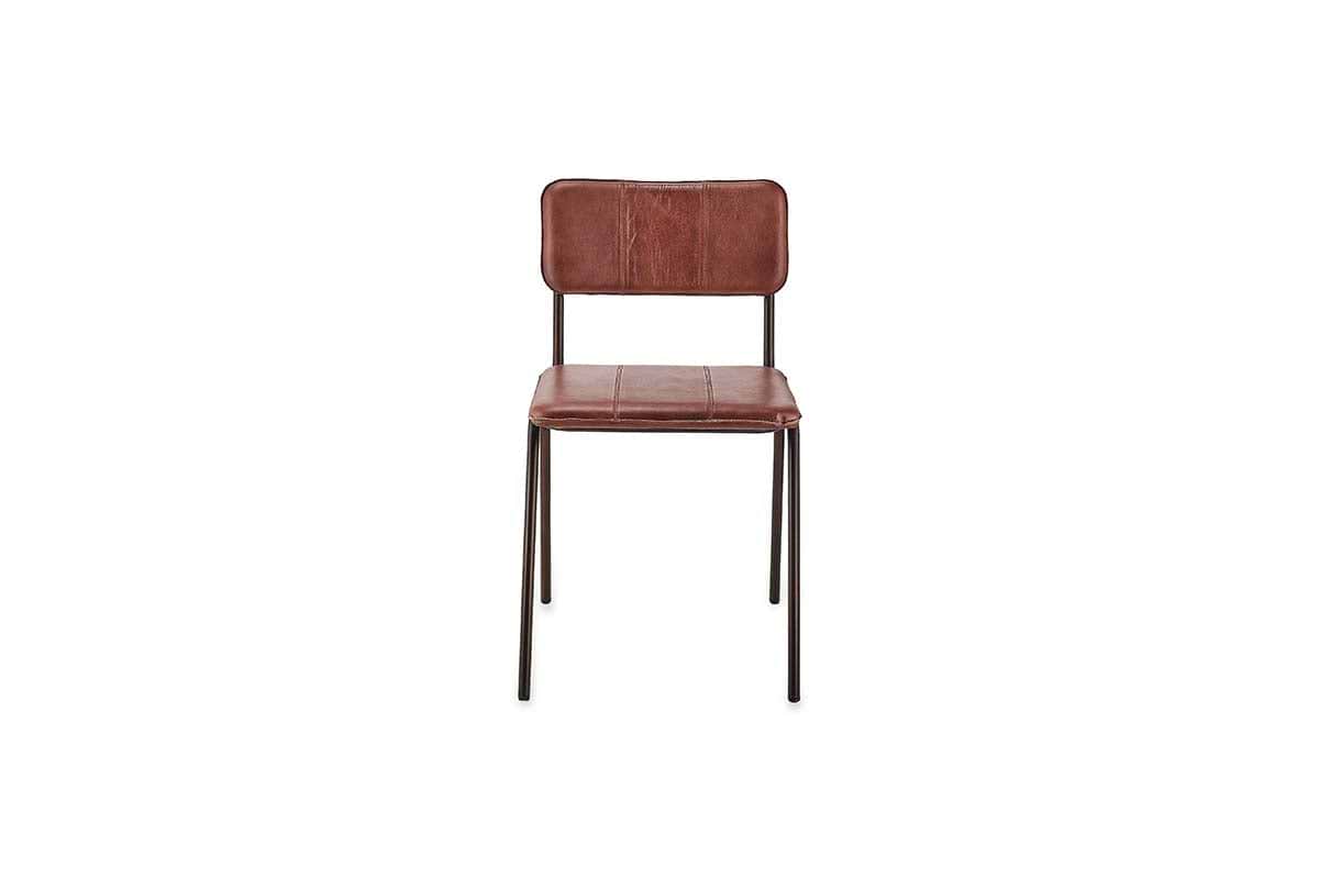 The nkuku Ukari Leather Dining Chair in chocolate brown features cushioned buffalo leather upholstery with stitching and thin black metal legs, making it a stylish choice for modern dining spaces.