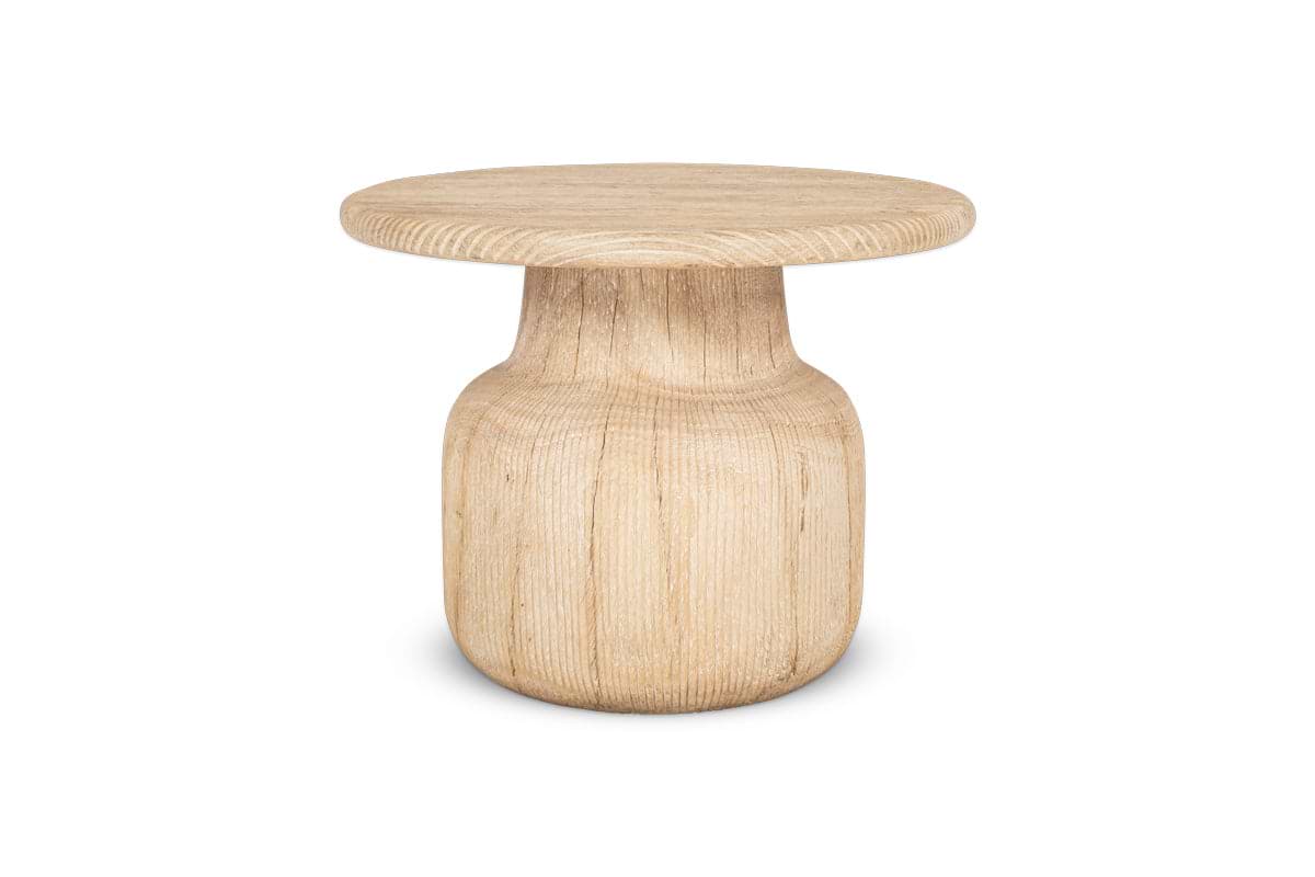 The nkuku Vivan Grooved Wood Side Table is a compact, lightweight piece made from sustainable mango wood, featuring a grooved round top and cylindrical base that highlights its natural grain and minimalist design.