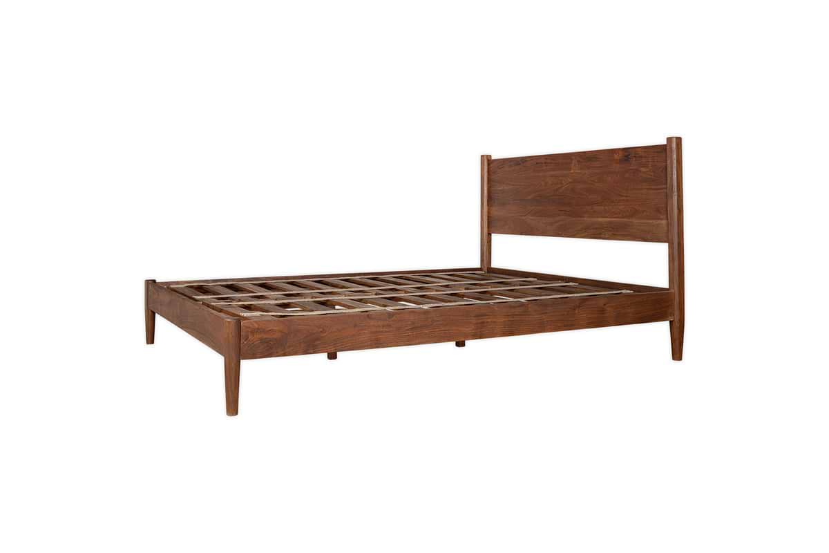 The Anbu Acacia Bed by nkuku features a tall, rectangular headboard and tapered legs. Crafted from acacia wood in a washed walnut finish, this minimalist, modern bed frame is shown without a mattress.