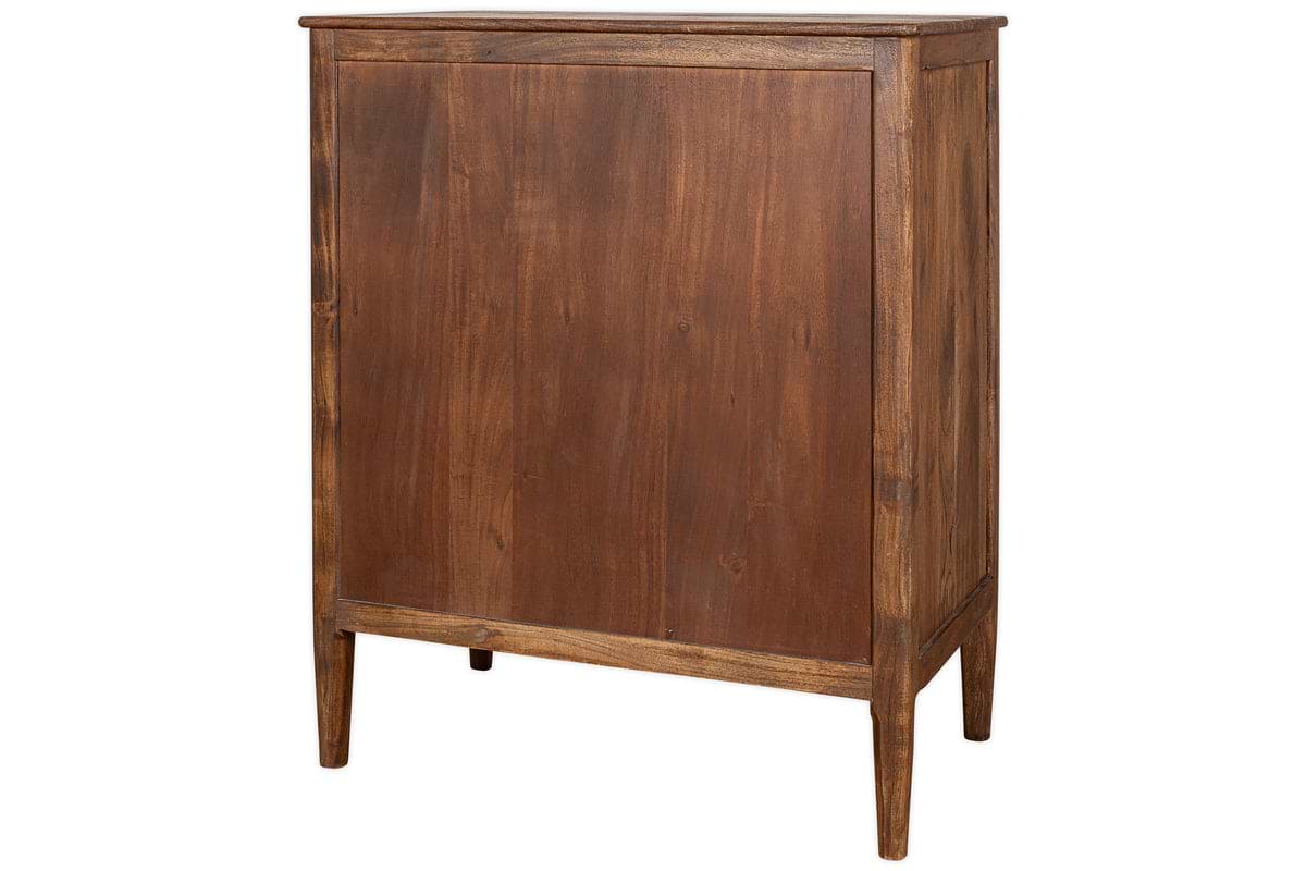The Anbu Acacia Chest of Drawers by nkuku features a tall, rectangular form with a plain front panel and slender legs. Its washed walnut finish combines minimalist elegance with functional bedroom storage for a calm, uncluttered space.