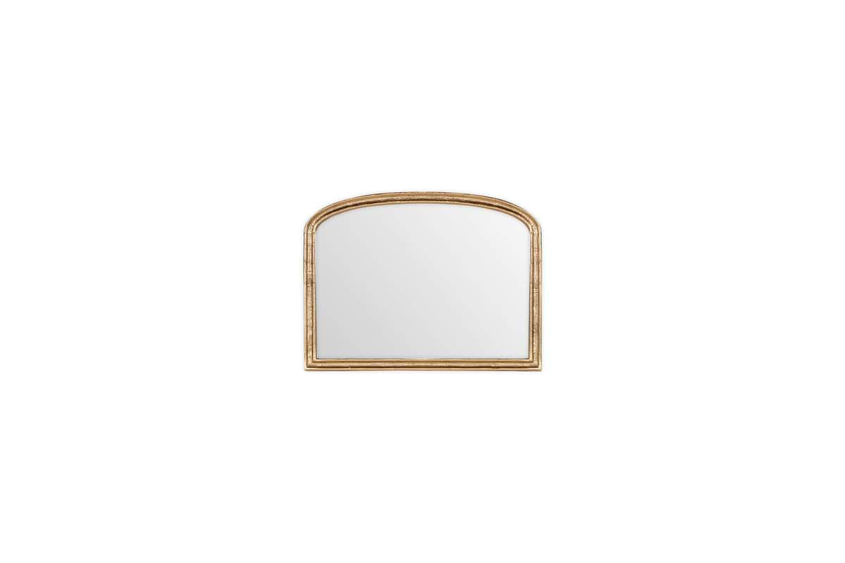 The nkuku Almora Wall Mirror – Antique Brass, Extra Small, has a rectangular shape with an arched top and a slightly distressed gold finish, shown against a plain white background.