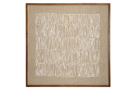 The Birala Hand Stitched Wall Art - Natural by nkuku features irregular vertical white stitching on textured beige fabric, framed in sustainable mango wood with a medium brown finish that enhances its neutral tones.
