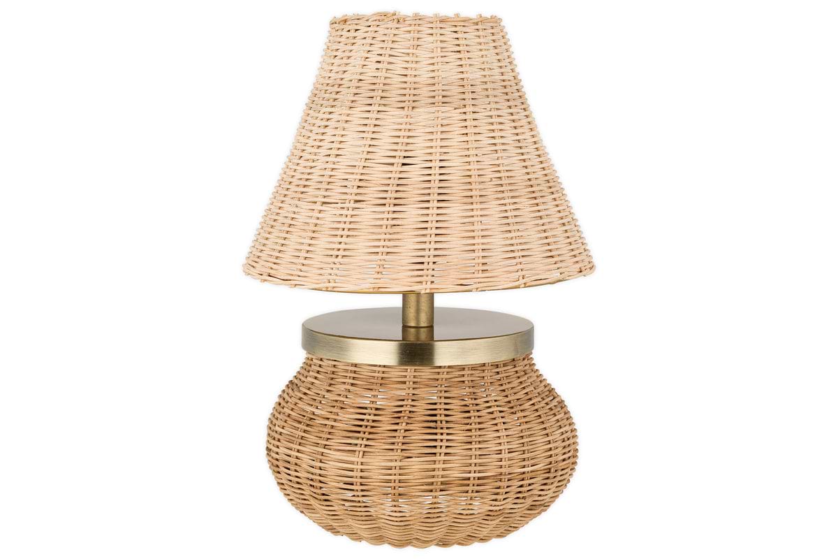 The Cija Rattan Table Lamp - Natural by nkuku has a woven rattan shade and base with a metallic band, offering soft ambient light and a natural tan hue—perfect as a bedside lamp in rustic or contemporary rooms.