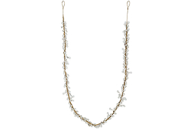 The Danvi Glass Drop Garland by nkuku features delicate brass wire and clear glass beads in a nature-inspired vine pattern, with loops at each end for securing in hair. Shown on a plain white background.