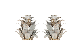 The nkuku Elagalu Pine Cone Candle Holders (Set of 2) are crafted from zinc with layered, spiky details and a rustic finish—stylish festive accents or unique Christmas candleholders for your tabletop.