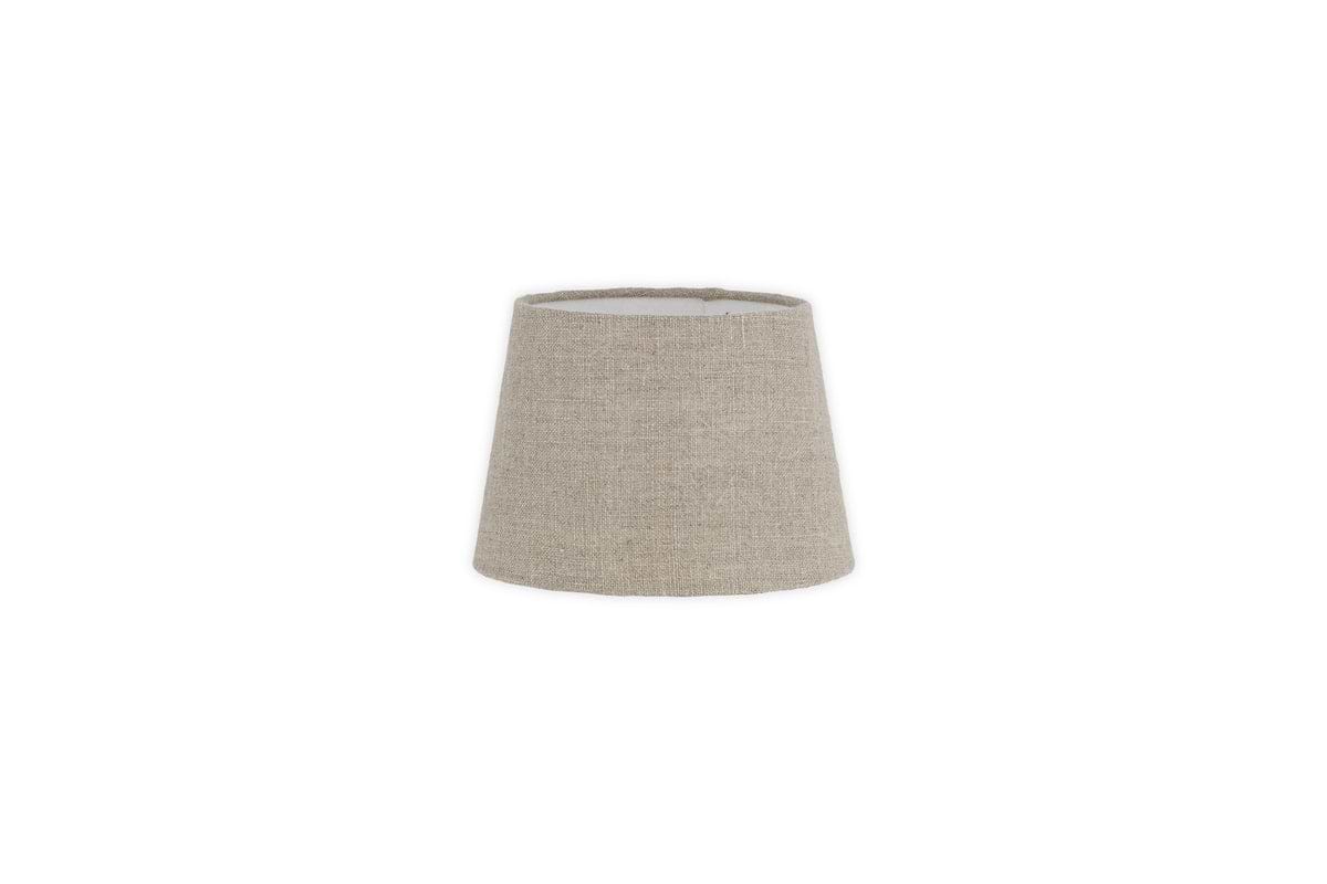 The Embaata Linen Lampshade - Natural by nkuku features a beige textured linen in a simple, tapered cylindrical design, shot against a white background—perfect for adding cozy bedroom lighting.
