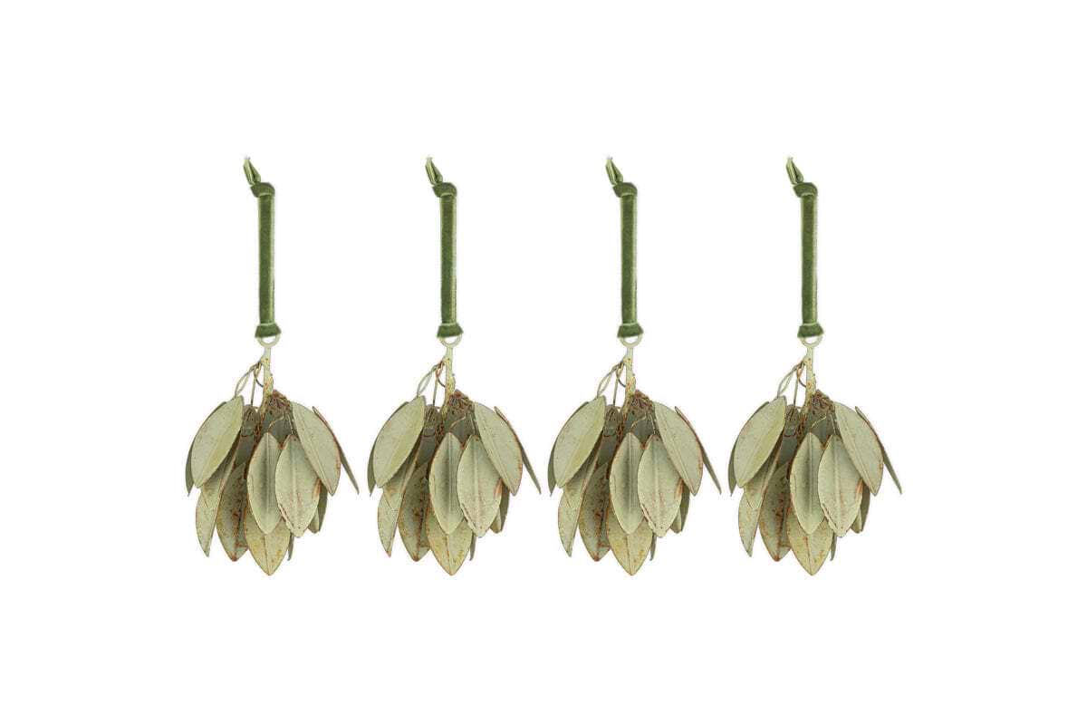 The Geeti Baubles - Soft Green (Set of 4) by nkuku feature pale, oval-shaped ornaments tied with green twine, inspired by nature. Hanging in a row, they add subtle charm and elegance to your space.
