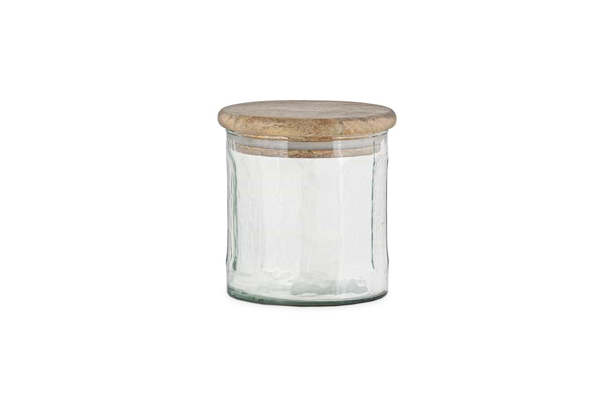 The nkuku Igoko Storage Jar - Clear features a textured glass body and a round, flat mango wood lid, making it a stylish kitchen organizer. Shown on a white background.
