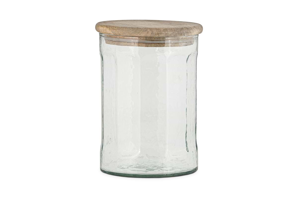 The nkuku Igoko Storage Jar - Clear features a textured glass body and a round mango wood lid, making it a stylish kitchen organizer. Shown against a plain white background.