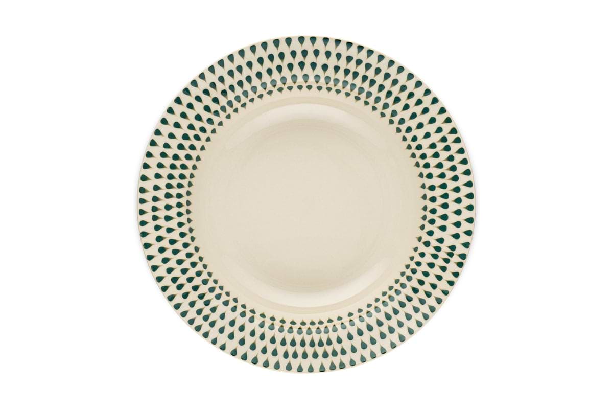 The nkuku Juniper Drop Pasta Bowl in cream and juniper features a modern ceramic design with green teardrop motifs around the rim on a white background, perfect for contemporary table settings.