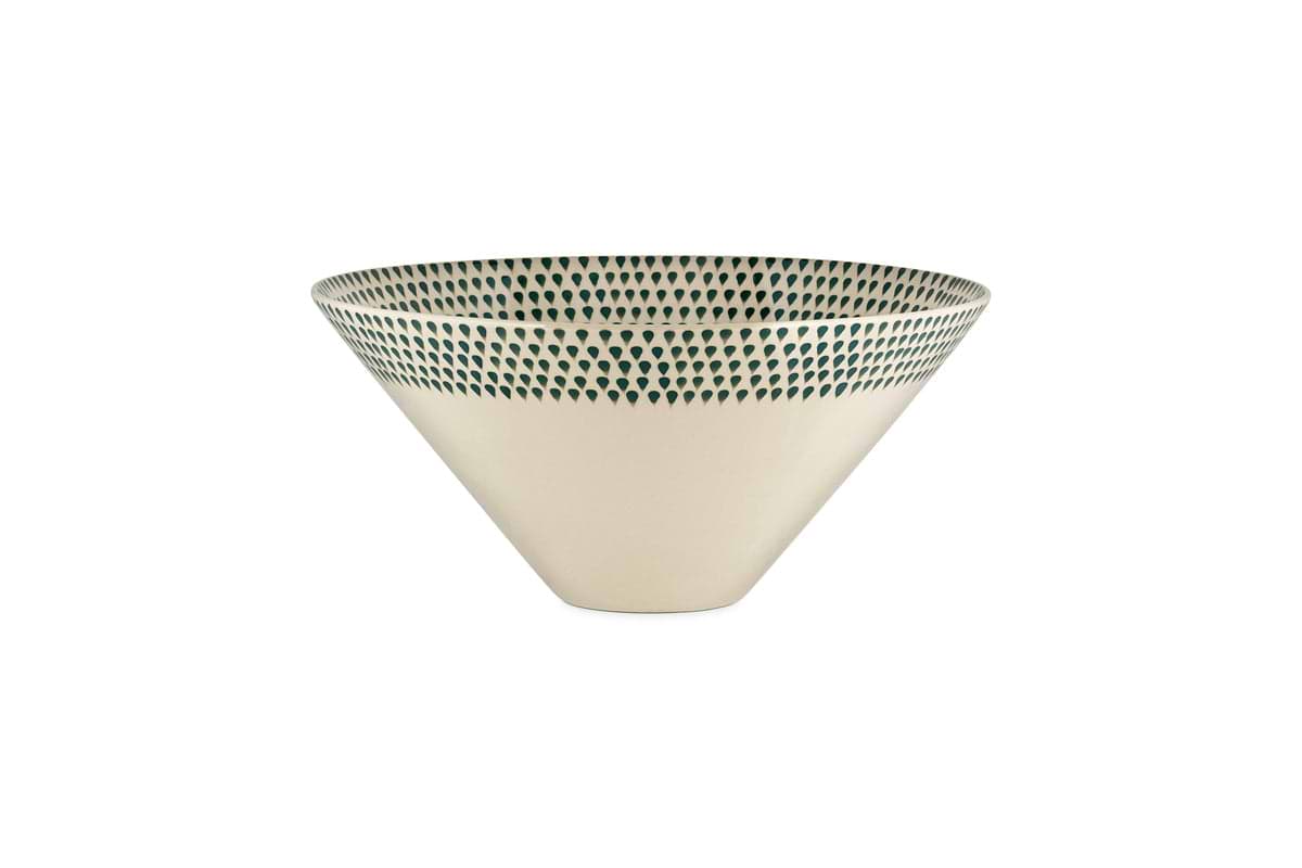 The nkuku Juniper Drop Serving Bowl in Cream & Juniper (Medium) features a decorative pattern, making it a stylish centrepiece for your table.
